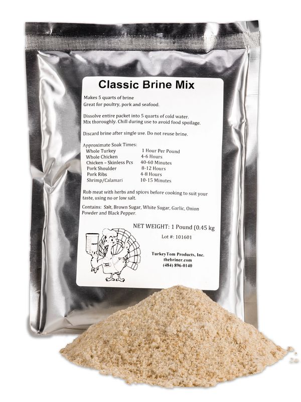 Classic Brine Mix seasoning packet with pile of brine mix powder for poultry, pork, and seafood.