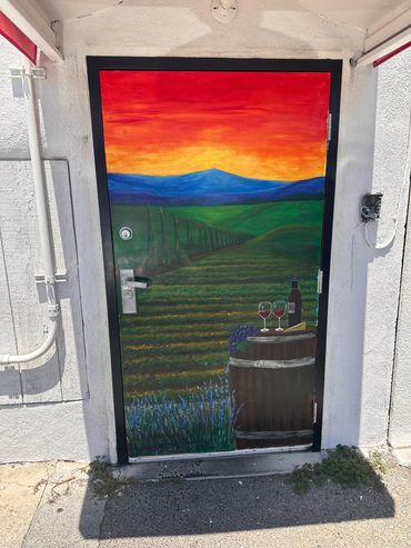 Colorful mural painted on restaurant door.