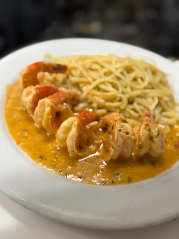 Shrimp pasta in creamy tomato sauce.