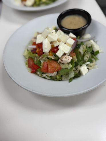 Fresh caprese salad with balsamic glaze.