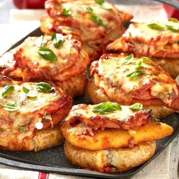 chicken Schnitzel parmi parmigiana potato sauce ham cheese