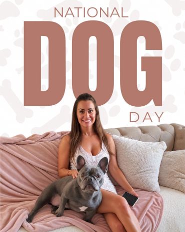 Woman and dog celebrating National Dog Day.