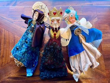 witchy dolls make from fabrice, broom corn and clay faces
