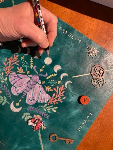 decorated leather mats for charm casting and pendulums