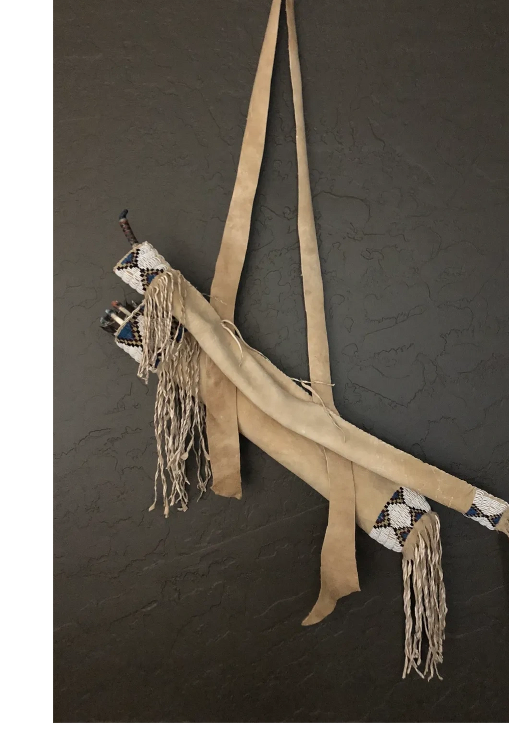 Northern plains style horn bow set. Dogwood arrows, brain tanned quiver beaded with old time colors.