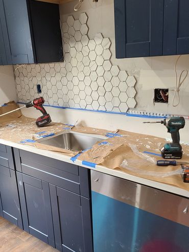 A custom kitchen backsplash