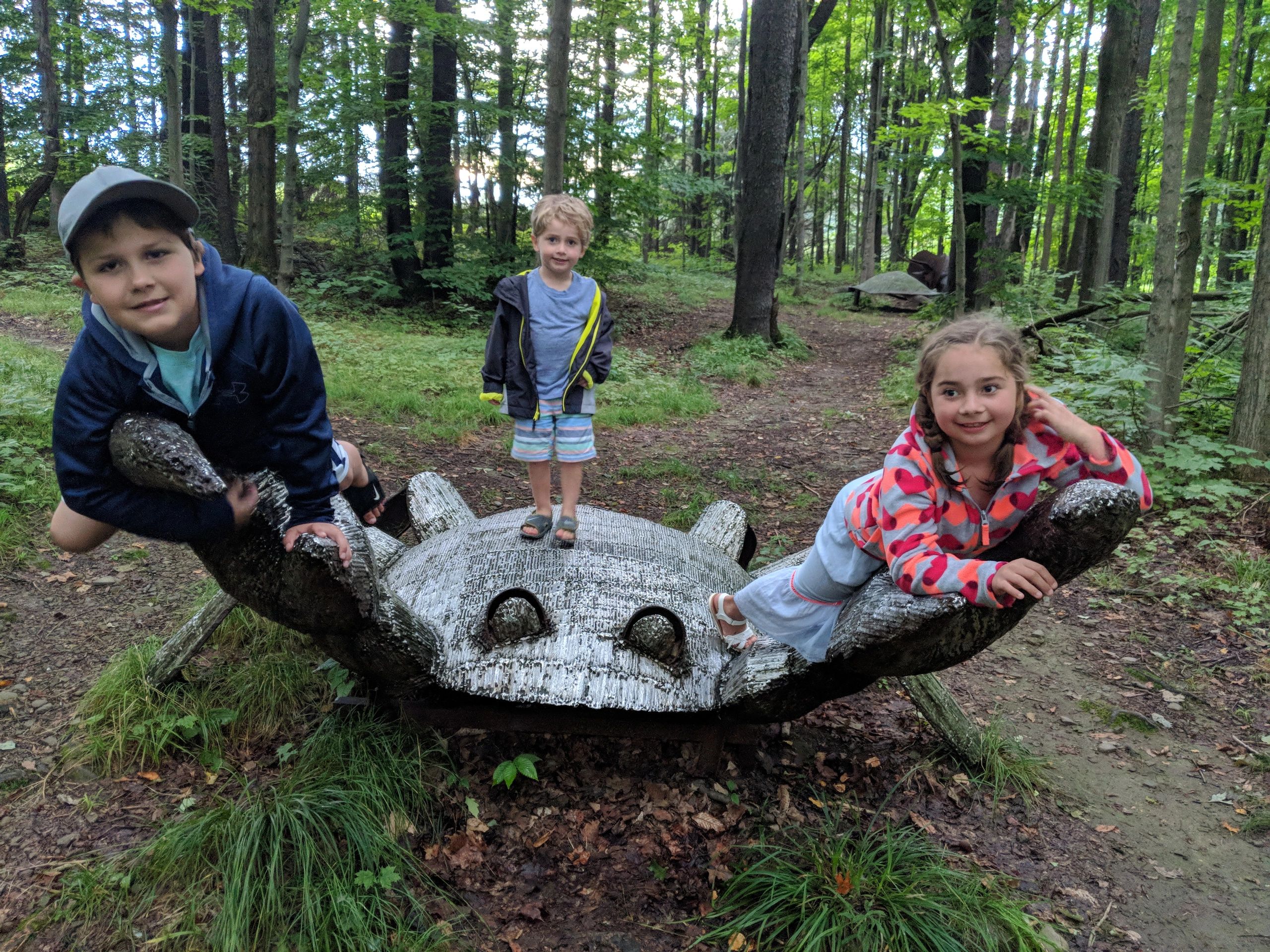 Children climbing on the animal sculptures at the Rohr Hill Road section of the Park.