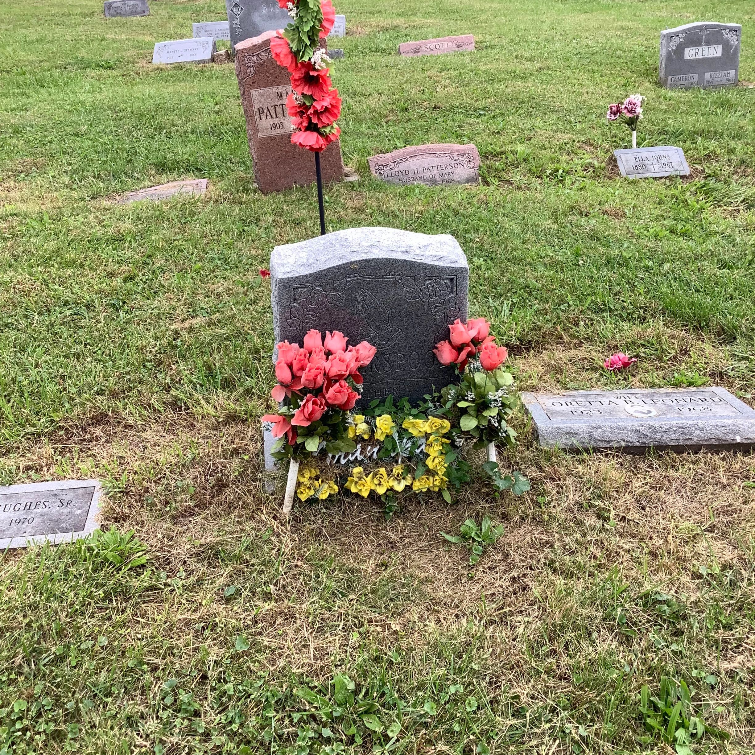 photo of gray gravestone