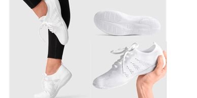 White sports shoes with black leggings.