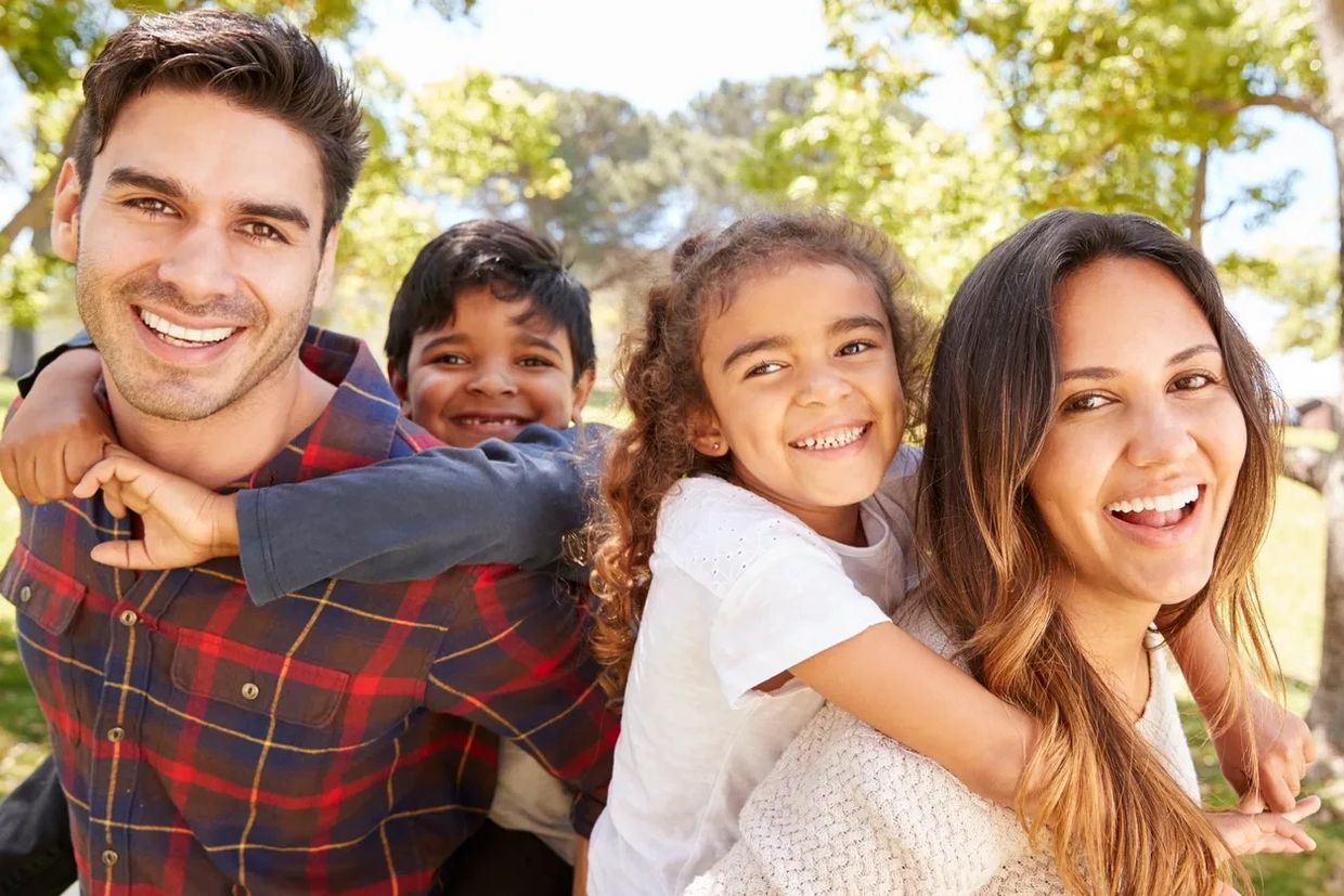 Family smiling after window cleaning in Parkland Florida