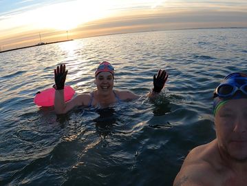 Two cold water swimmers in the Thames estuary at Chalkwell beach