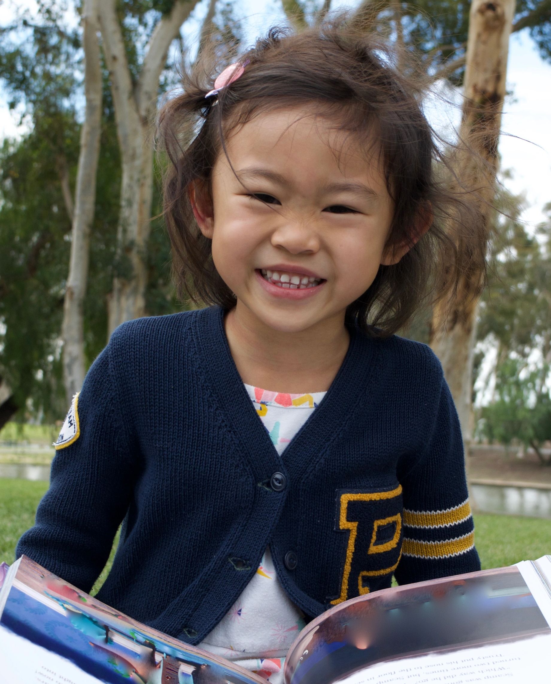 Penny B. Jen, author/co-creator of the Princess and Unicorn Stories, smiling to the camera.