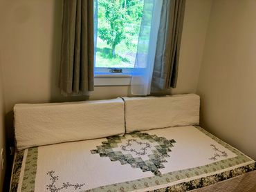 day bed in living area for extra guest