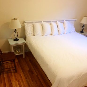 close up of bed and nightstands