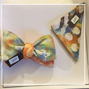 Colorful bow tie and matching pocket square with a watercolor pattern.