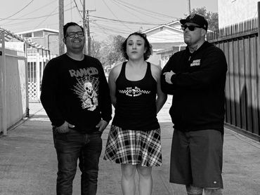 Broke and Down. Ivan, Miss Kenzi, and Jon-ny in a Long Beach alley