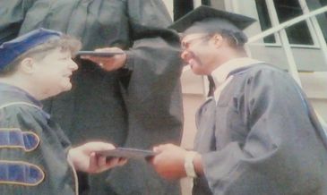 Receiving my Masters of Arts Degree 2012