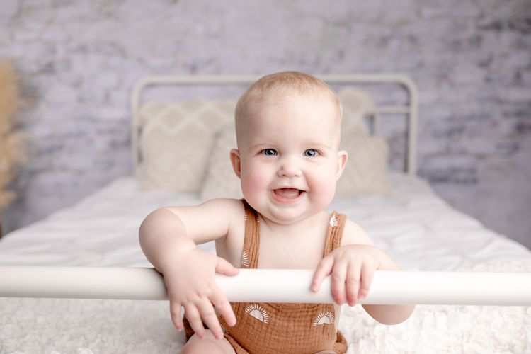 In studio session with 1 year old girl located in Owatonna Minnesota