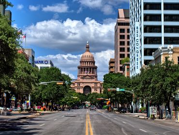 View of Texas State Capitol building on a sunny day in Austin.