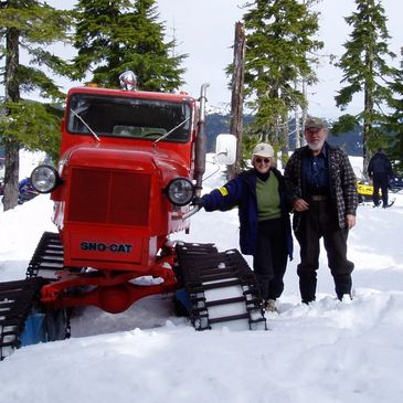 One of the founding members of the club, Jack Sloan, beside his 1968 Tucker Sno-Cat