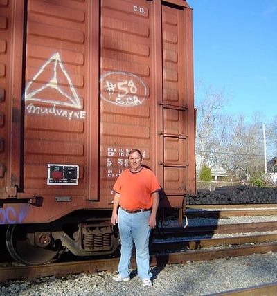 Image of Walter Parks by A boxcar