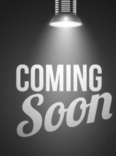 Black and white image with 'COMING Soon' text under a spotlight.