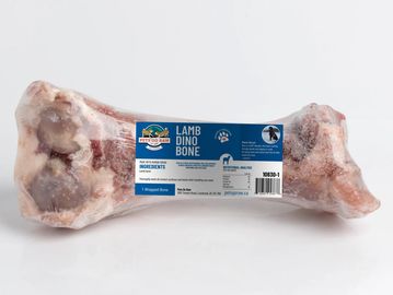 Frozen lamb dino bone dog treat with label.