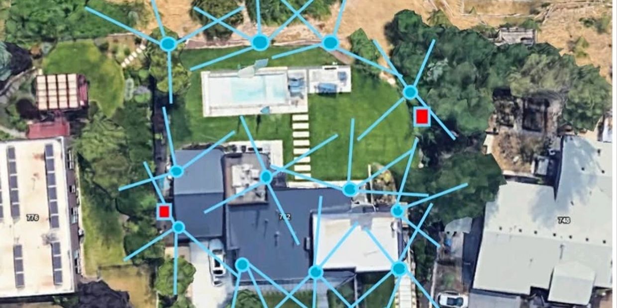 Aerial view of a property with network lines overlay.