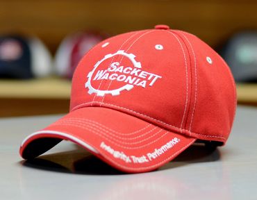 custom hats, embroidered caps, leather patch hats, custom trucker caps, mesh back caps, company hats