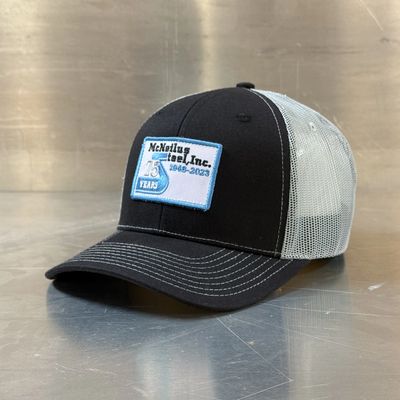 Mesh back trucker cap black twill with grey mesh, embroidered patch.