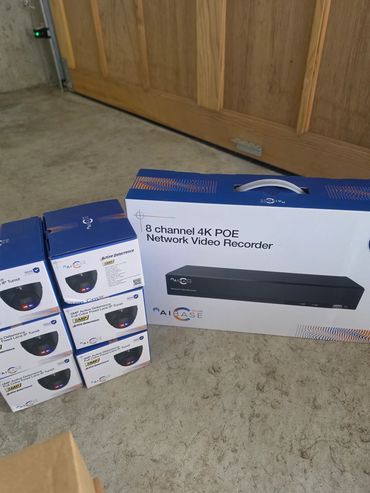 Boxed security camera system and network video recorder.