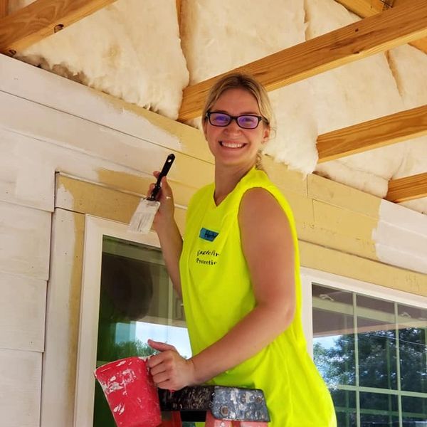 Heather Baker, Eagle Fire Protection's marketing director, volunteers with Habitat for Humanity.