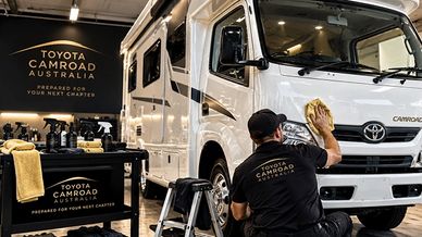 Toyota Camroad motorhome undergoing professional pre-delivery preparation, representing the vehicle