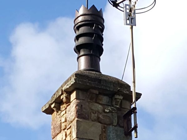 Brick chimney stack on modern contemporary house