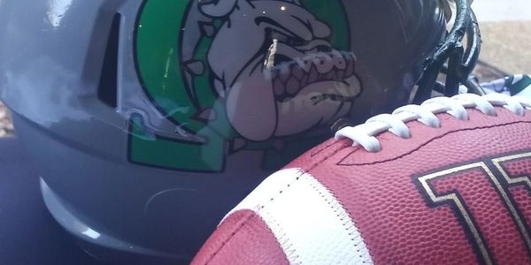 close up image of Omega Prep Football helmet