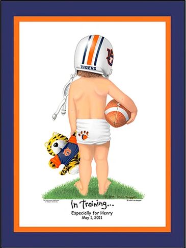 Little barefoot Auburn football player in training, wearing helmet, holding football and toy tiger.