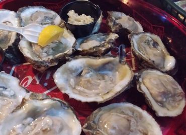 Freshly Shucked Oyster’s on the Half Shell served w/Cocktail Sauce, Horse Reddish Sauce, Wedge of Le