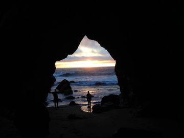 Sunset in one of the caves of Point Reyes on a backpacking tour.