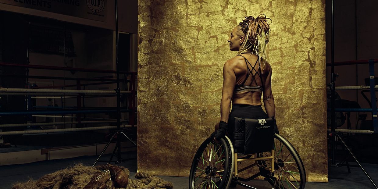 Portrait of Female Adaptive Boxer Luiz Faye, in her wheelchair in a boxing ring

Image by Sane Seven