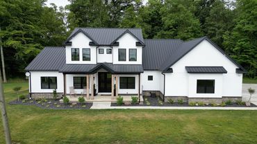two-story house with gray roof