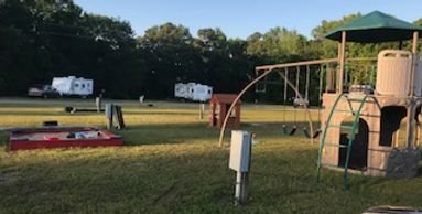 Playground for the kids at Amazing Texas Rv Resort & Campground in Tatum Texas.  Located in Texas.