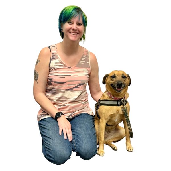 Picture of Elaine kneeling next to Pumpkin