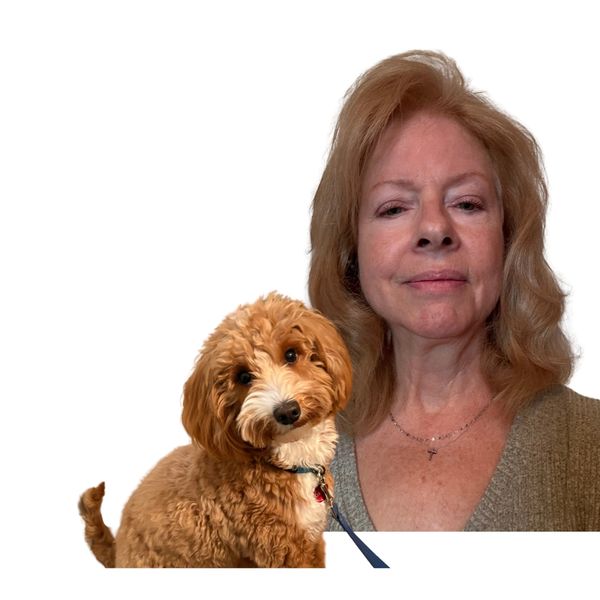 Picture of Cathy and her mini goldendoodle, Gracie
