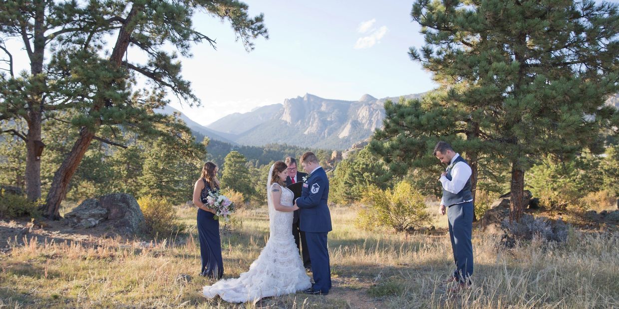 Elopement in Estes Park Colorado Microwedding officiant flowers