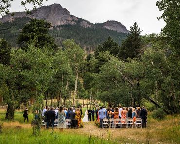 Wedding ceremony at O'Connor Pavilion in Estes Park  by Marry Me In Colorado Estes Park CO