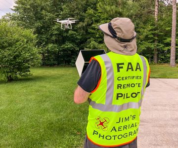 Jim of Jim's Aerial Photography is flying a DJI Phantom 4 Pro preparing to do a roof inspection.