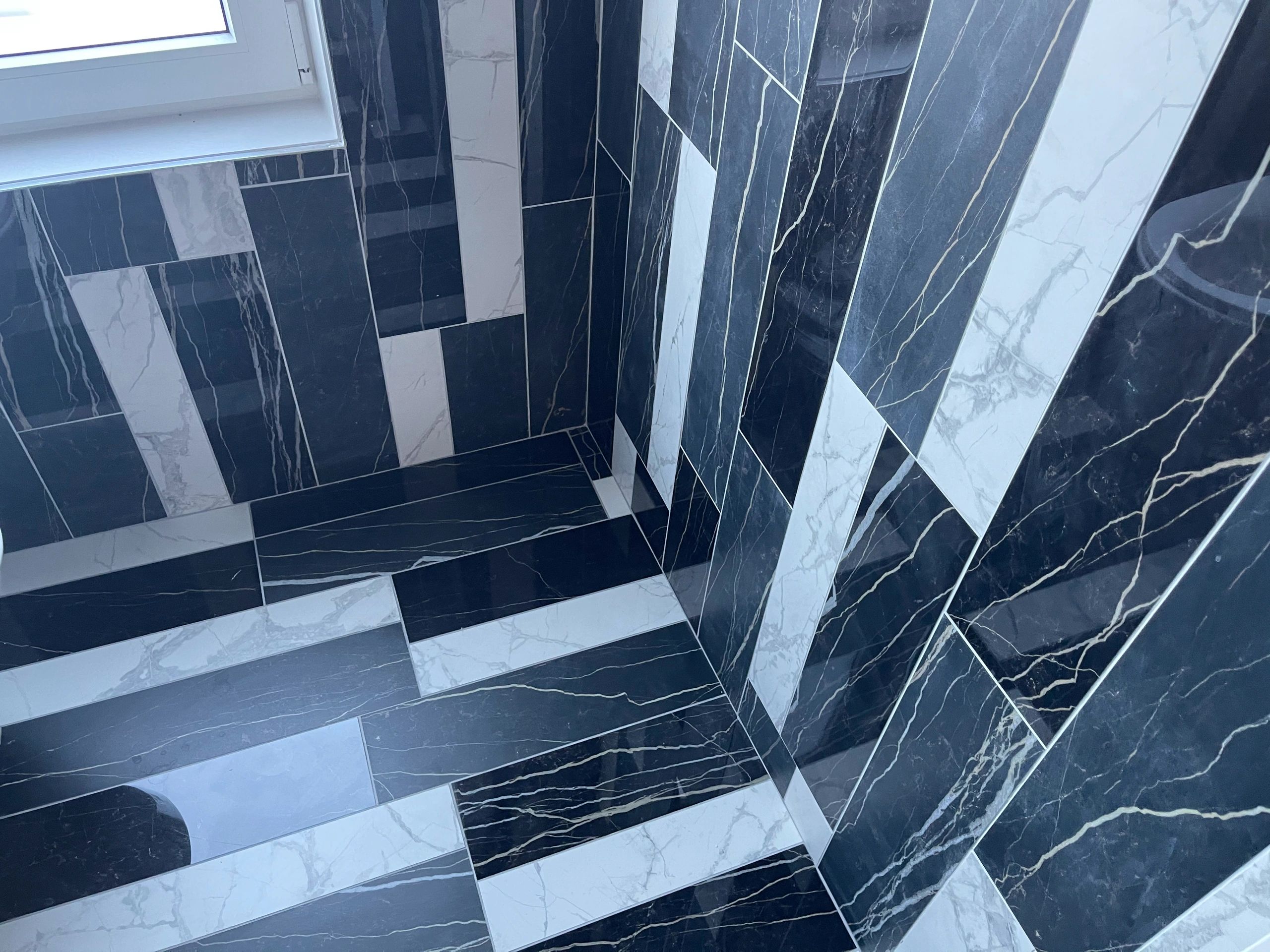 Renovated bathroom, beautiful tile.