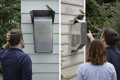 man and wife pointing to their gas fireplace vent with a bird sitting on top of it