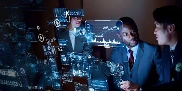Business team analyzing futuristic digital data projections.