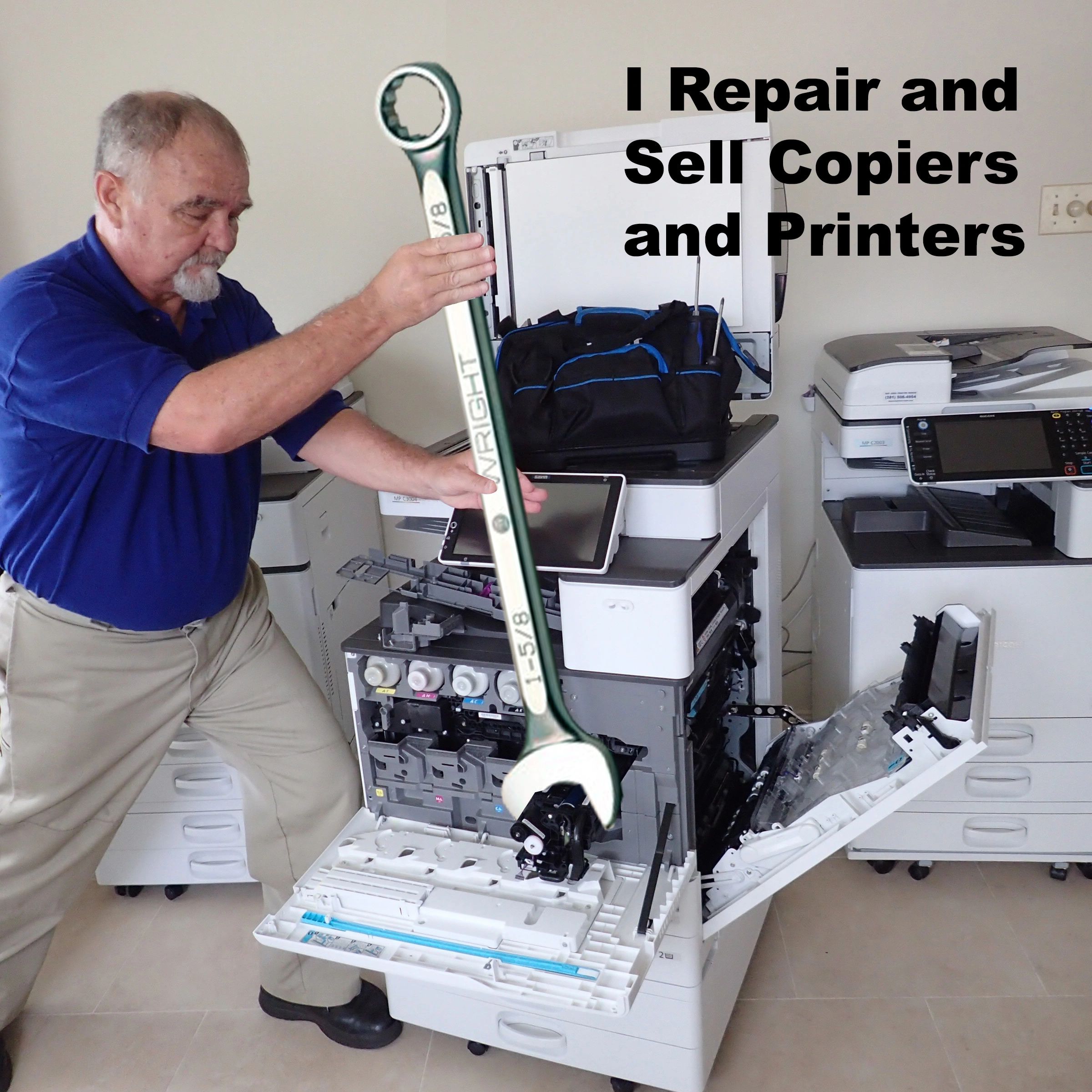 Copier Technician working on a copier.